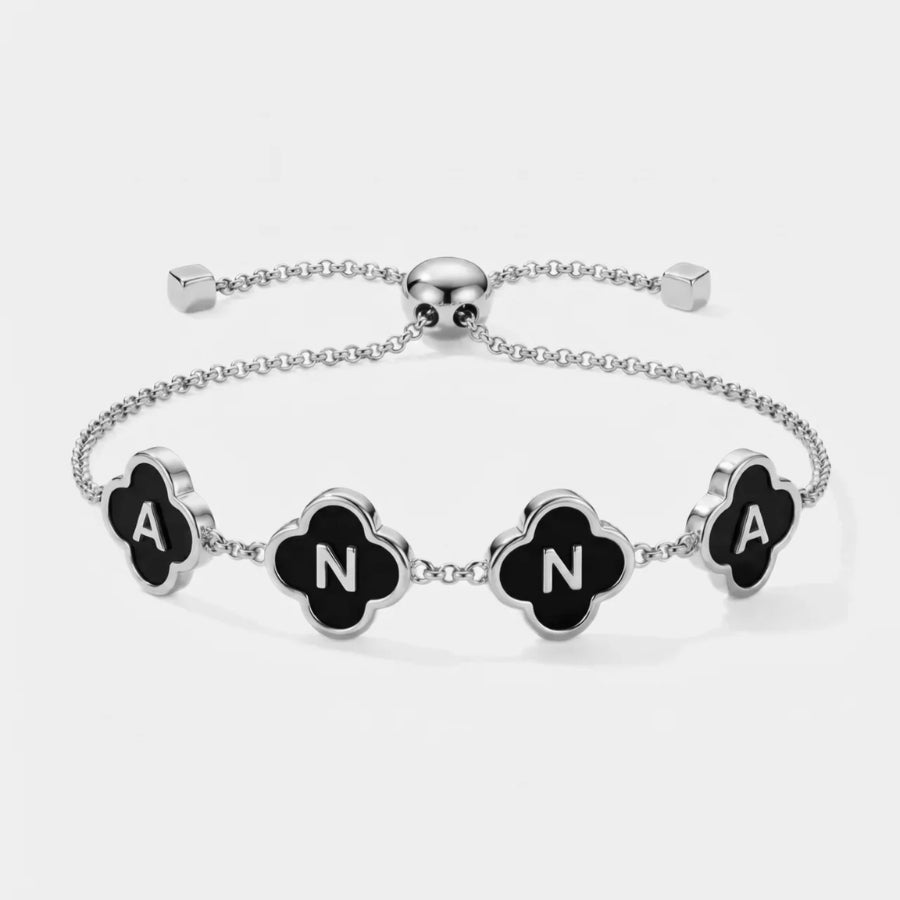 Personalised Black Enamel Clover Bracelet texture close-up