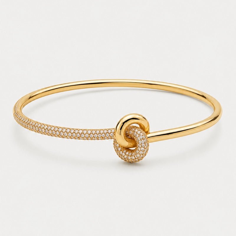 Brazalete Rígido Tennis - Nudo Central Oro