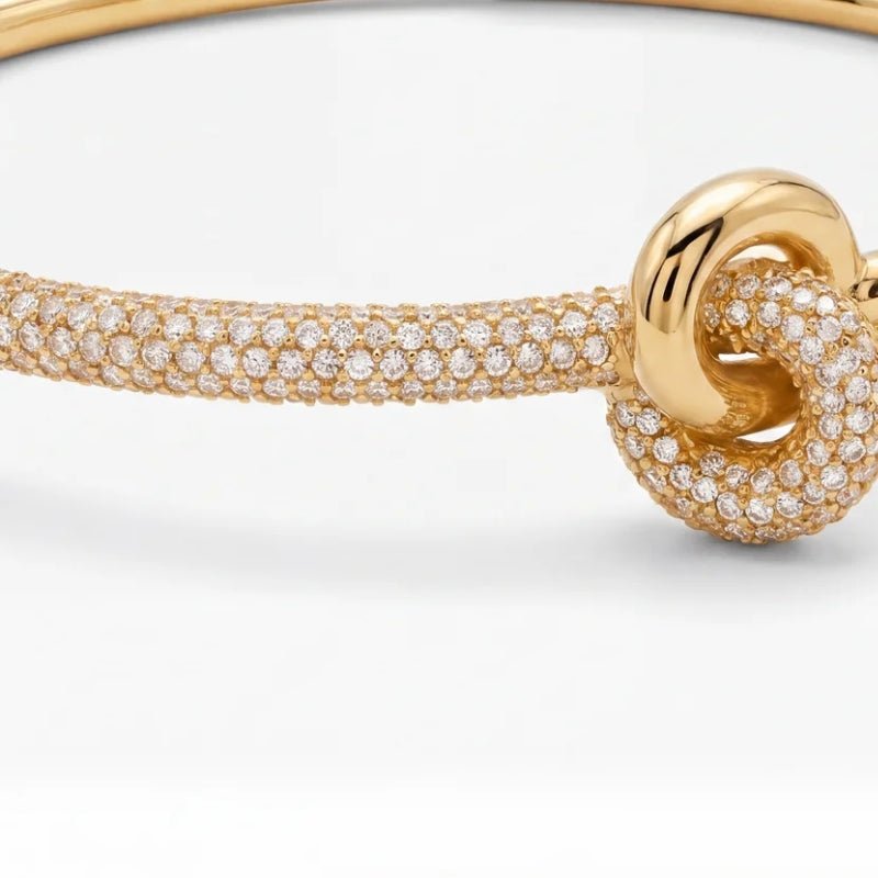 Brazalete Rígido Tennis - Nudo Central Oro
