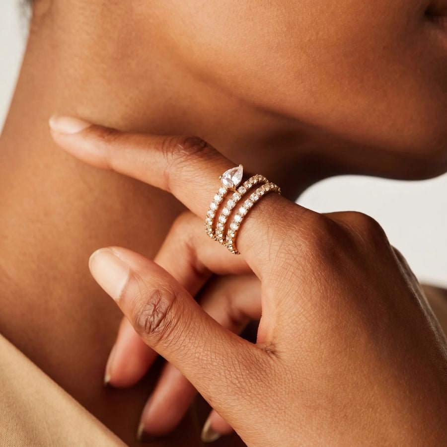 Anillo Pear Wrap Tennis